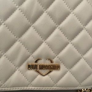 New never used love Moschino bag